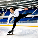 Pettit National Ice Center**

"A fully clothed, professional speed skater in a sleek racing suit, gliding across the pristine ice of the Pettit National Ice Center's Olympic oval. Focus on the skater's form and speed. Background shows the spacious arena with spectators in the stands, all appropriate and family-friendly. Perfect anatomy, correct proportions, natural pose, dynamic action shot, safe for work, appropriate content, high quality."

**